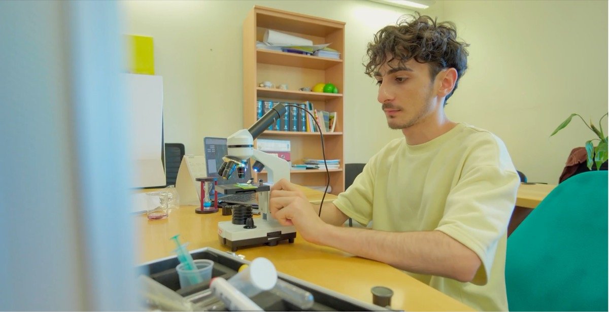 Narek in a research and project management setting